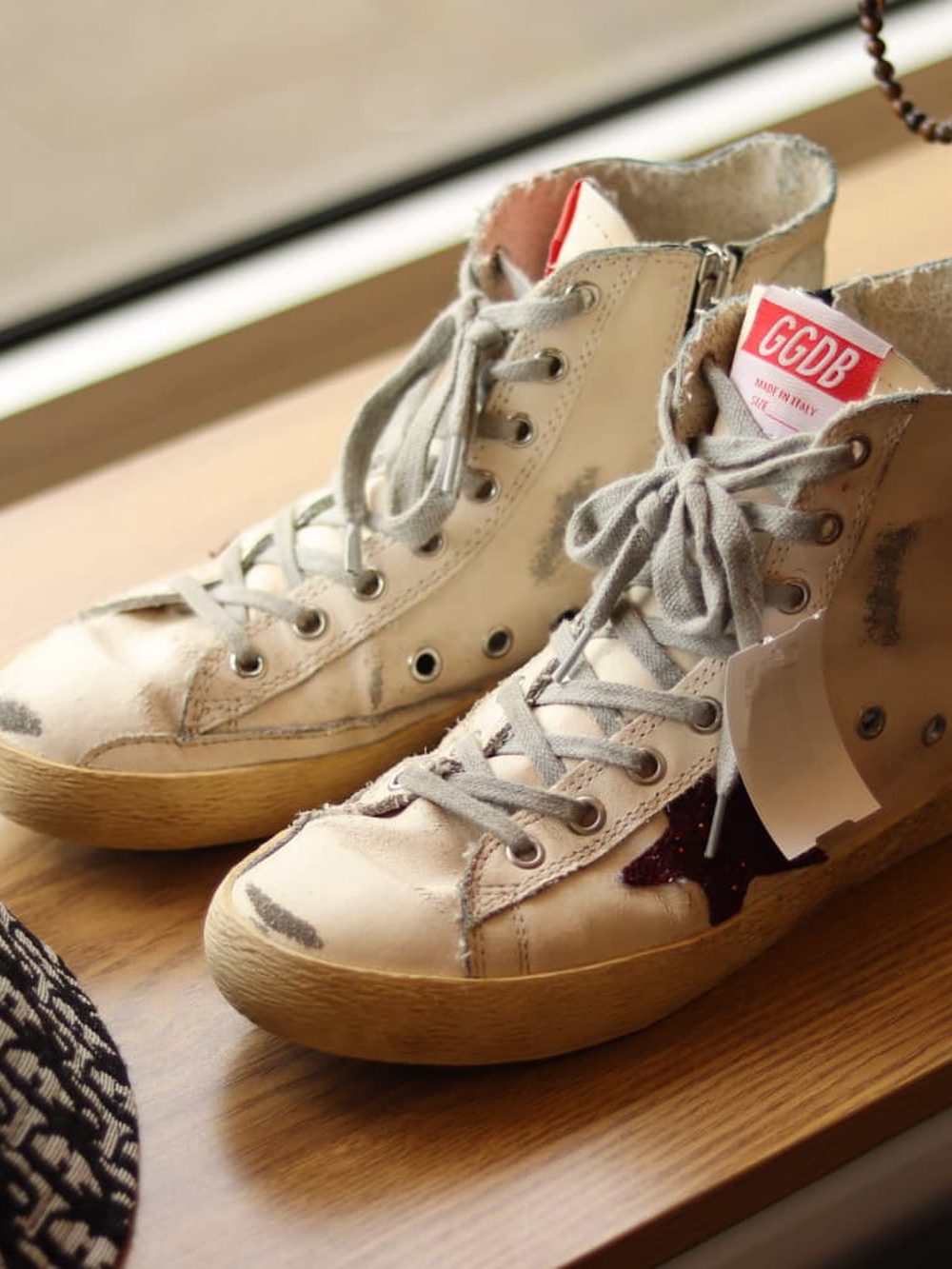 Pre-loved designer sneakers